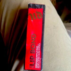 Urban Decay Lip Bond gloss in unbreakable